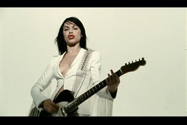 PJ Harvey - This Is Love