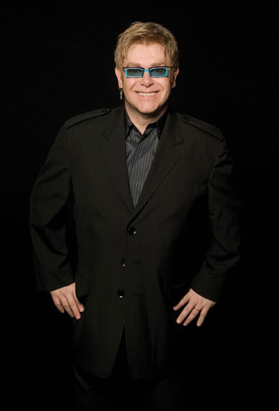 Elton John - Big Man In A Little Suit